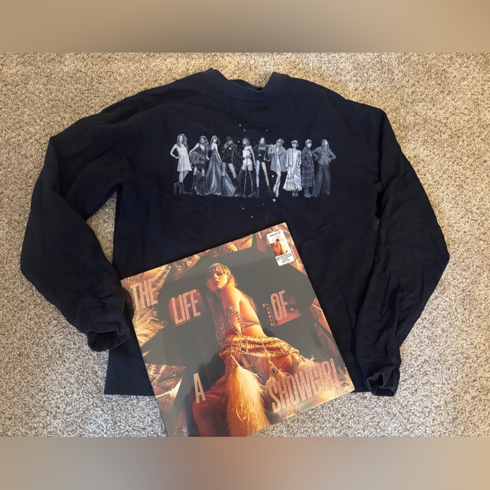 Taylor Swift Midnights sweatshirt and Life of a Showgirl vinyl